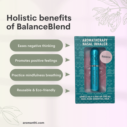 A pink background with an image of the blue balance aromatherapy nasal inhaler and text that states holistic benefits of balance blend eases negative thinking, promotes positive feelings, practice mindfulness breathing, reusable and eco friendly