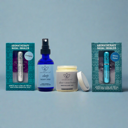 The everyday self-care bundle by Aromanthi. Includes a white backdrop with 4 aromatherapy products which are Shea + Cocoa body butter, energize aromatherapy nasal inhaler, stress relief aromatherapy nasal inhaler, and sleep therapy spray.