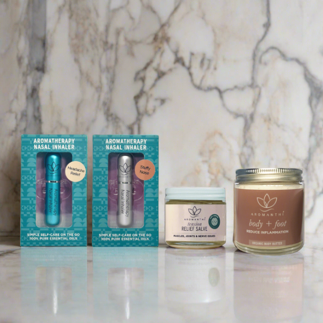 A physical wellness bundle by aromanthi that is displayed against a marble background