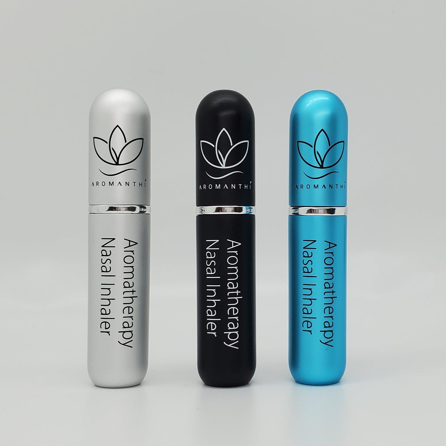 Aromatherapy nasal inhalers by aromanthi with 3 different colors to choose from- silver, black, and light blue