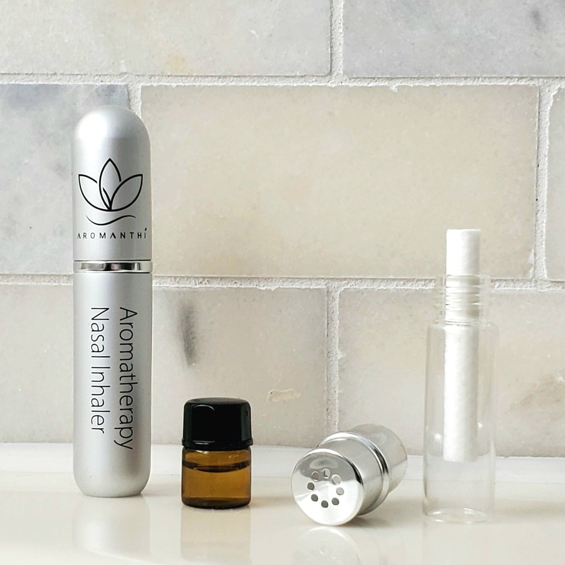 Aromanthi aromatherapy nasal inhaler is a reusable tube made from aluminum. It comes with a custom essential oil blend. This product is only the essential oil refill.