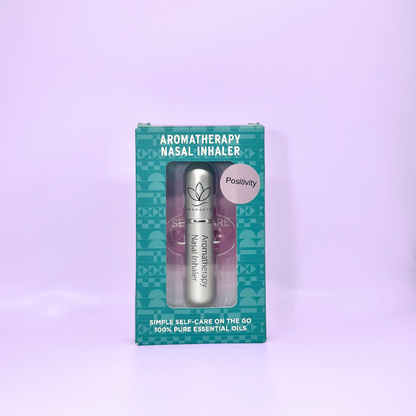 A display of the ecofriendly Aromanthi positivity aromatherapy nasal inhaler for simple self care on the go made with 100% pure essential oils in silver color option