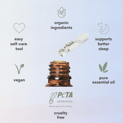 A close up view of an essential oil bottle with symbols and text surrounding stating organic ingredients, supports better sleep, pure essential oil, peta approved cruelty free, vegan product, easy self care tool