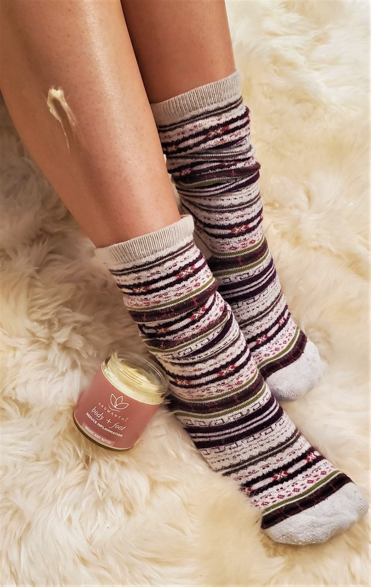 A photo of a woman's leg with the body butter melted on it