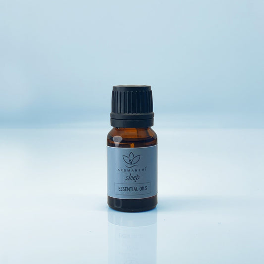 A light blue background with the image of Sleep Essential Oil Blend 10ml - Aromanthi Clean Beauty & Wellness